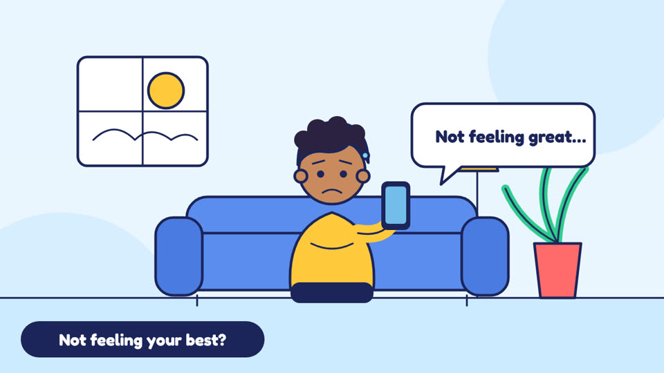 A patient at home on the couch with a phone